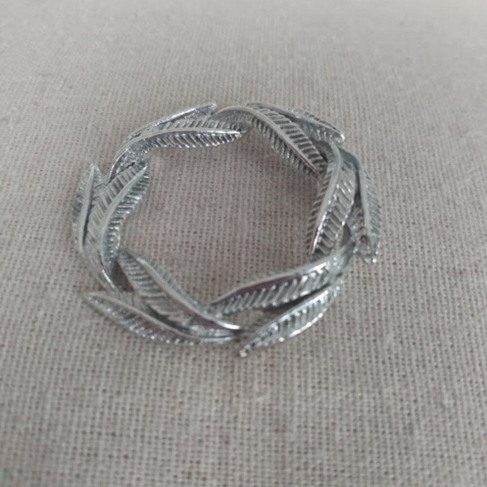 Gerry's: silver tone textured circle leaf brooch.